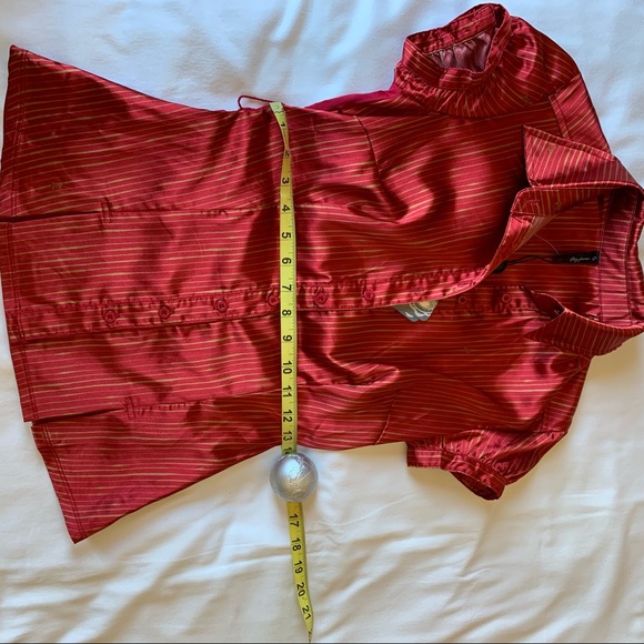 Red satin feel too with gold print in small and cones with optional belt. - Picture 8 of 12